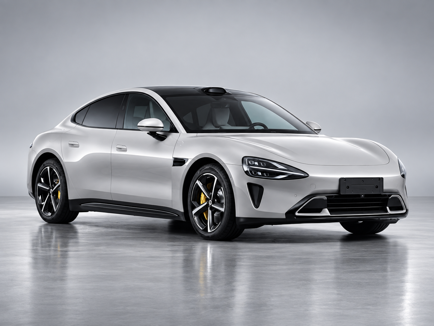 Silver electric vehicle in a premium studio